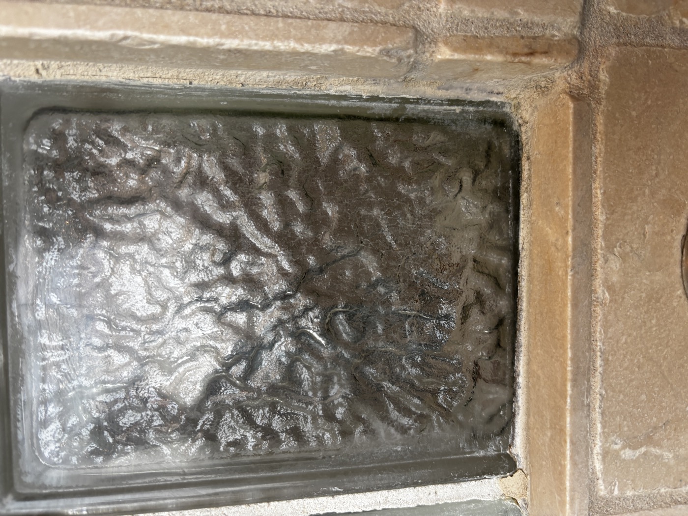 Glass blocks after hard water mineral removal treatment