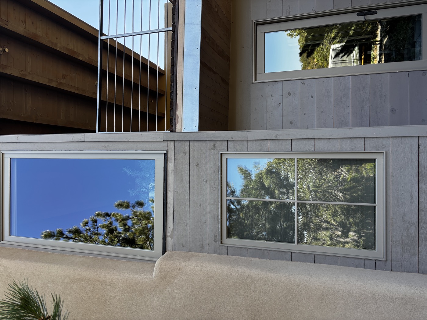 Spotless windows reflecting blue Santa Fe sky after cleaning